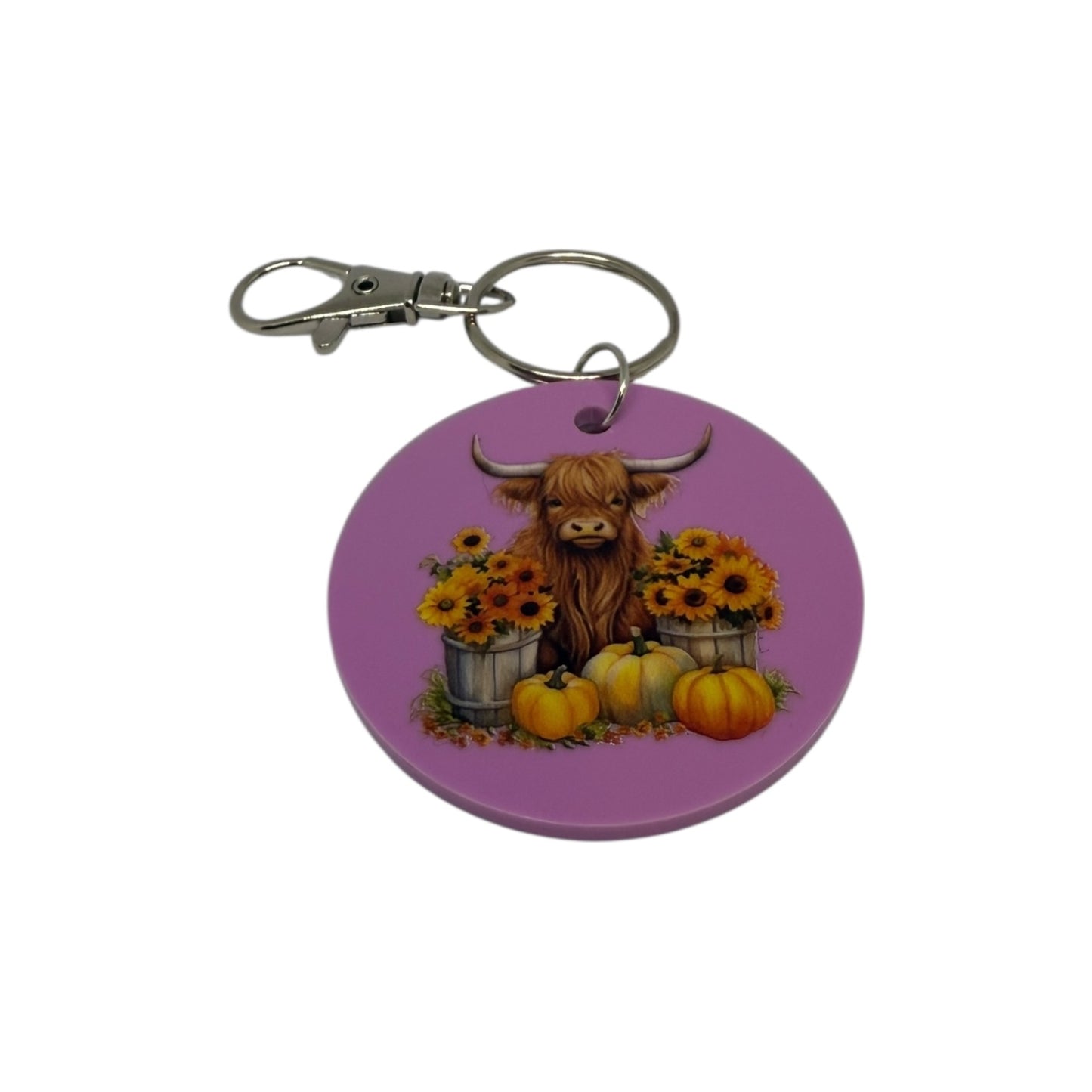 Highland cow with Orange pumpkins keyring