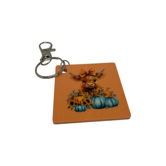 Highland cow with Blue Pumpkins Keyring