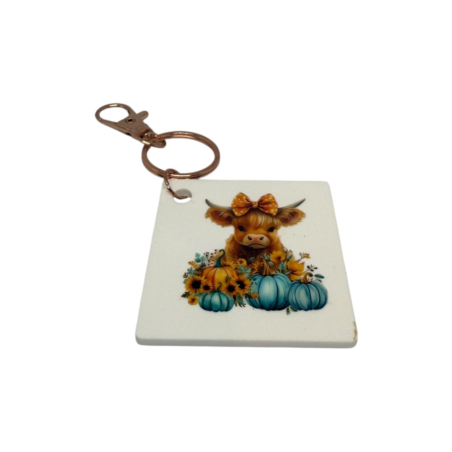 Highland cow with Blue Pumpkins Keyring